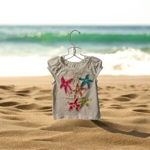 Cherokee Toddler Girl’s White Tee with Colorful Starfish 2T